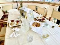 SHANGRA yacht charter: Aft deck table setting