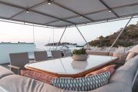 AQUILA yacht charter: Sundeck table other view