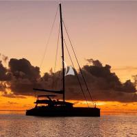 SYLENE yacht charter: Sunset at anchor sistership JOY Â© C.J. Coetzee
