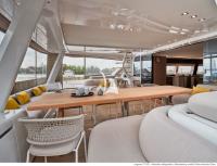 SYLENE yacht charter: Cockpit table extended for 10 guests