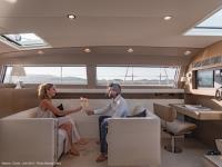 NEYINA yacht charter: Saloon with sofas facing each other