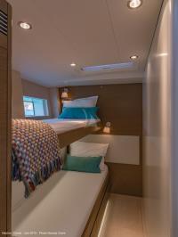 NEYINA yacht charter: Starboard bunk-bedded-cabin. The lower bed can shift to a double bed