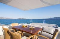 SUN-ANEMOS yacht charter: Aft deck with alfresco dining and Sunpad