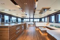 ATRAVERSIA yacht charter: Main deck saloon and opened kitchen area