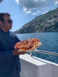 DON-MICHELE yacht charter: Chef Errico with grilled seafood