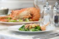 ARAMIS yacht charter: lobster is served