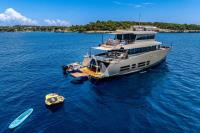KOKONUTS-WALLY yacht charter: At anchor with toys