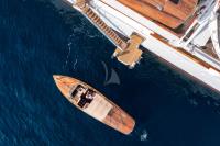 CHRISTINA-O yacht charter: Hacker Craft tender docking
